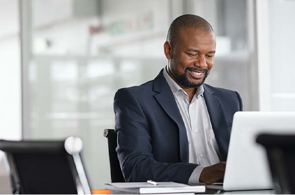 man on laptop at work