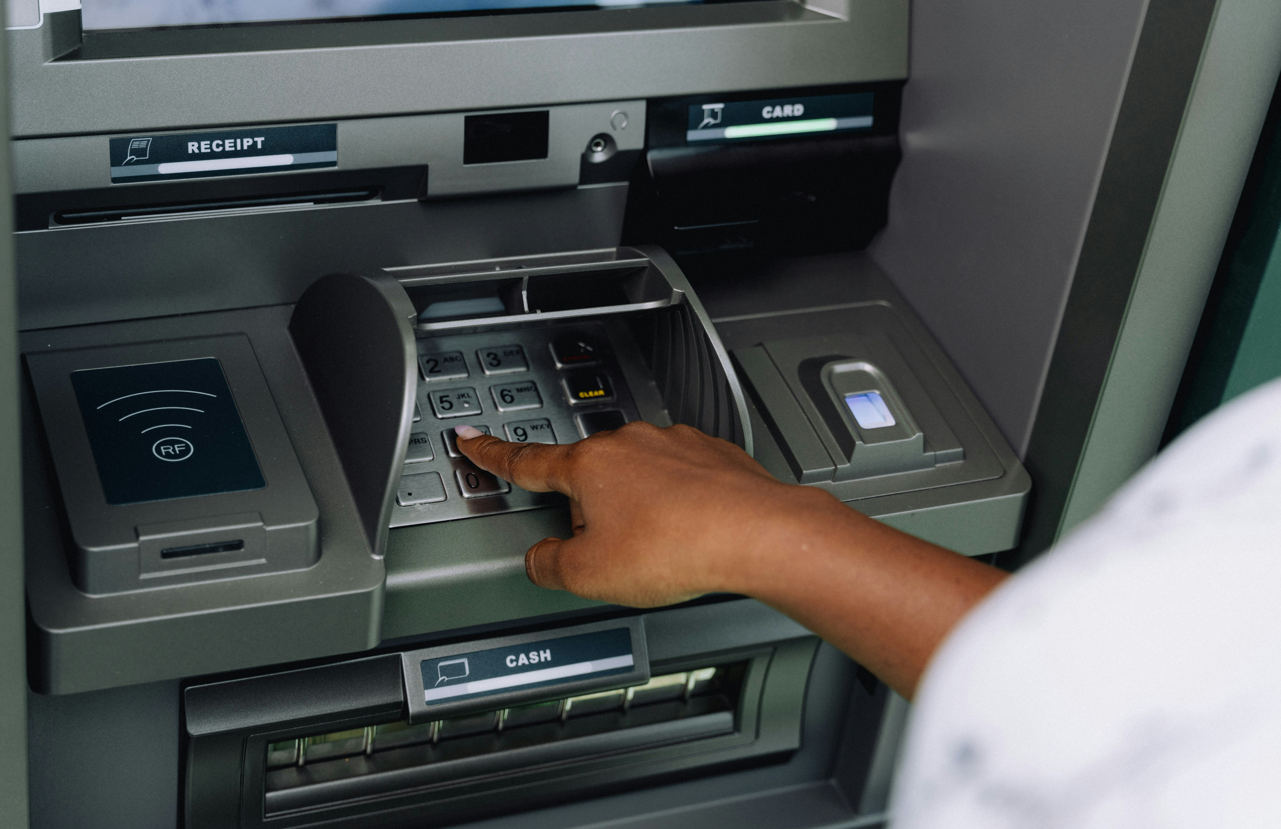 person using an atm machine